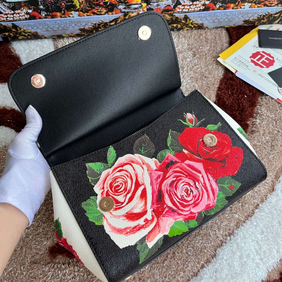 Dolce & Gabbana Miss Sicily top handle bag with vibrant red rose print leather High