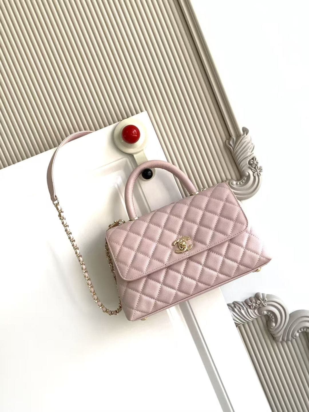 FLAP BAG WITH TOP HANDLE Grained Calfskin & Gold-Tone Metal A92990 Light-Pink Binding A