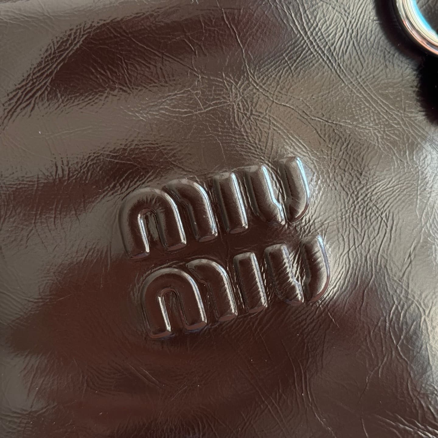 Miu Miu Shiny leather top-handle bag Briarwood Calfskin 5BA327 TOP
