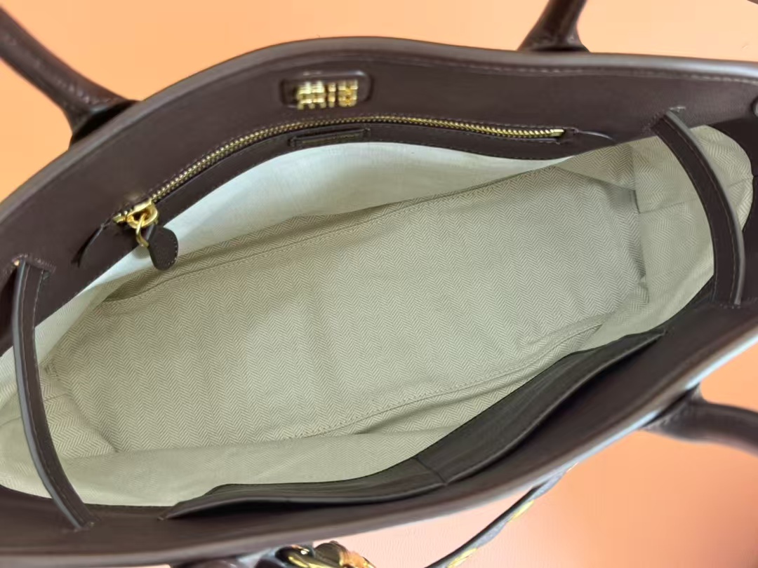 Miu Miu Aventure nappa leather Medium bag in Briarwood Top