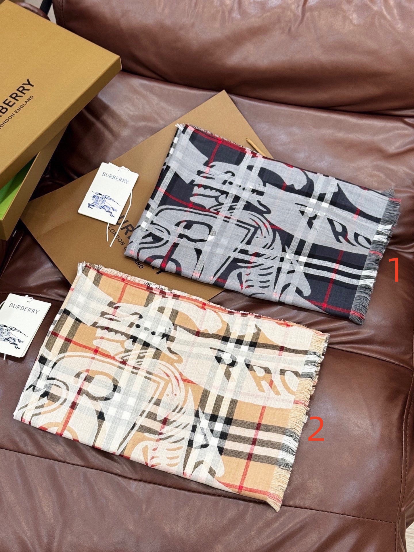 Burberry scarf featuring  check pattern and equestrian knight motif