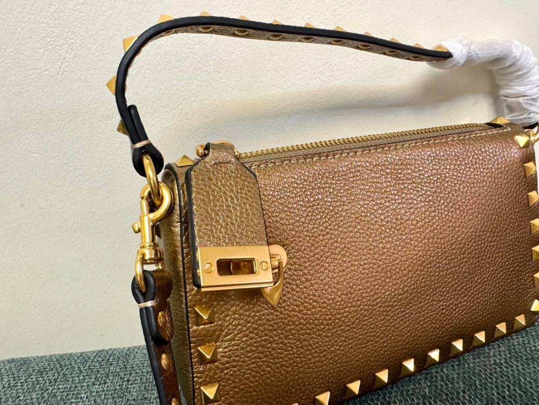 Valentino Garavani Mini Rockstud crossbody bag in Gold Grained Metallic Leather High