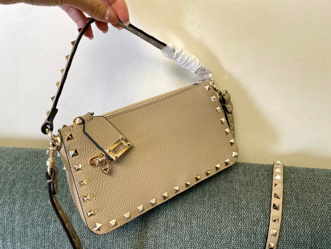 Valentino Garavani Mini Rockstud crossbody bag in Beige Grained Calfskin High