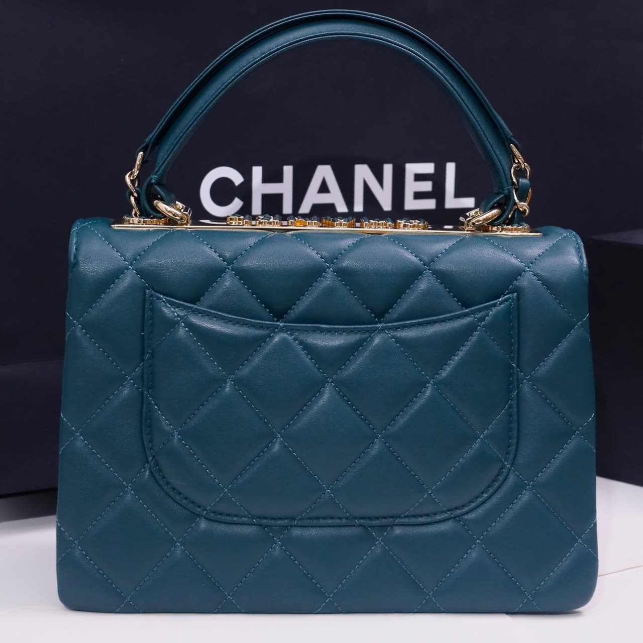 SMALL FLAP BAG WITH TOP HANDLE Lambskin Gold Metal Deep Blue A