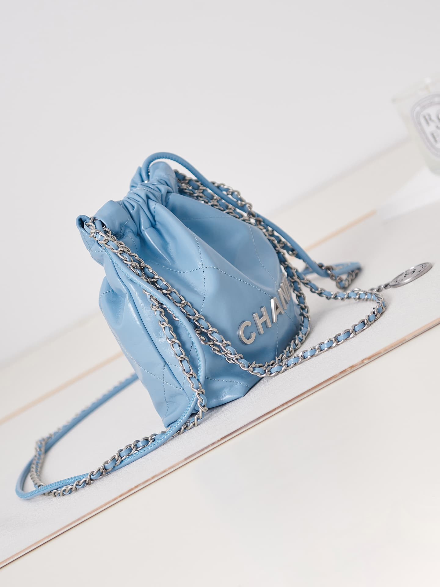 Chanel 22 MINI HANDBAG Shiny Calfskin Blue & Silver-Tone Metal AS3980 A