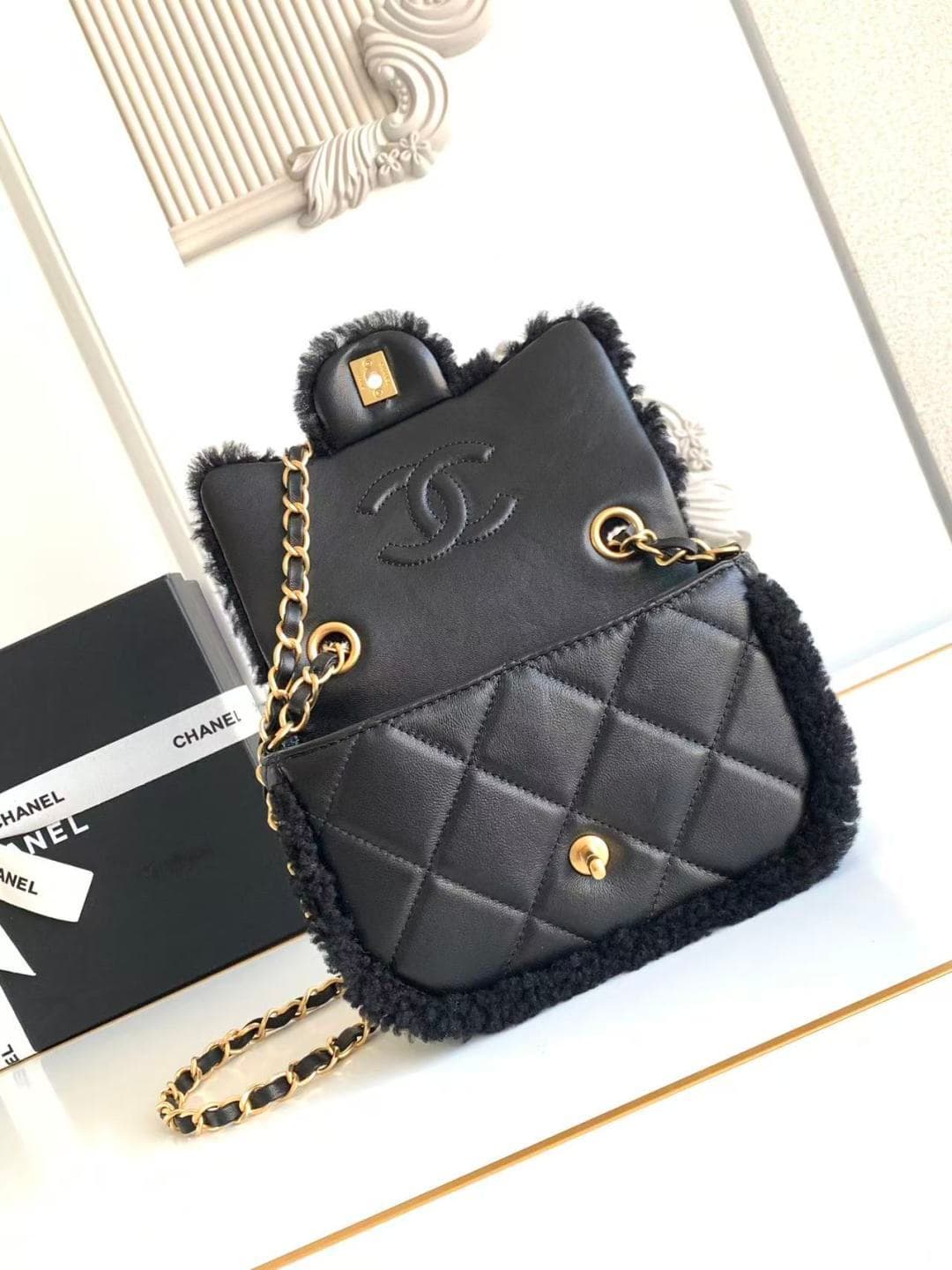 Chanel Mini Shearling Flap Bag in Black lambskin with black shearling & Gold-Tone Metal AS5148 A