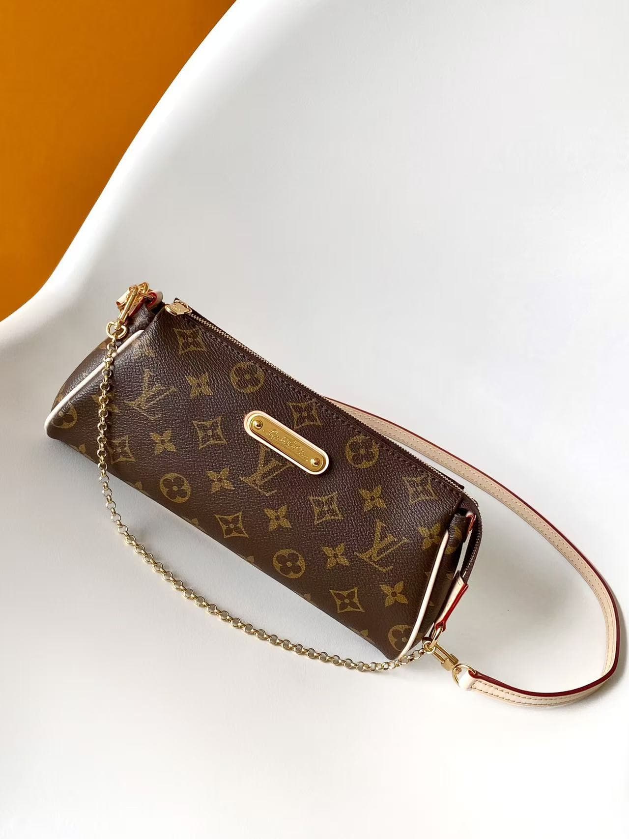 Louis Vuitton Pochette Eva Monogram coated canvas M13567 High