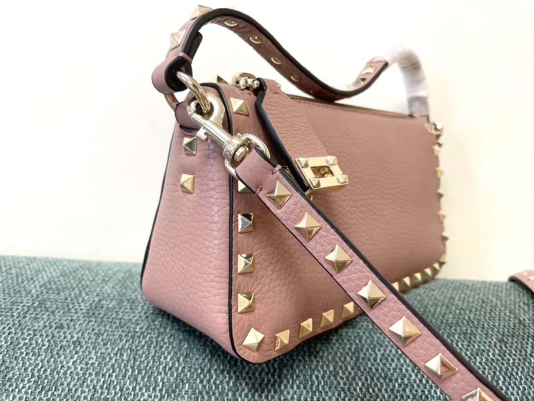 Valentino Garavani Mini Rockstud crossbody bag in powder pink Grained Calfskin High