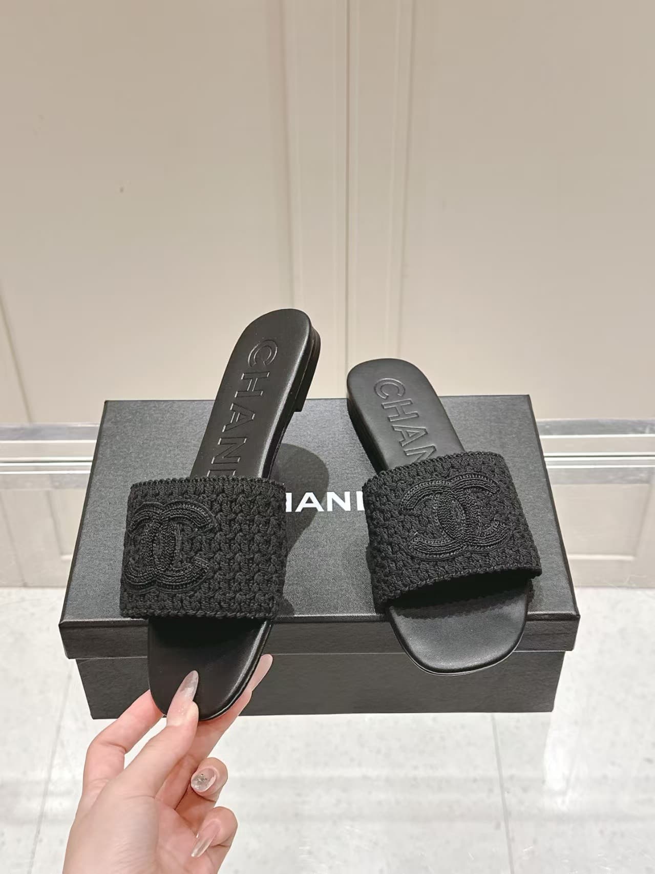 Chanel black crochet CC mules