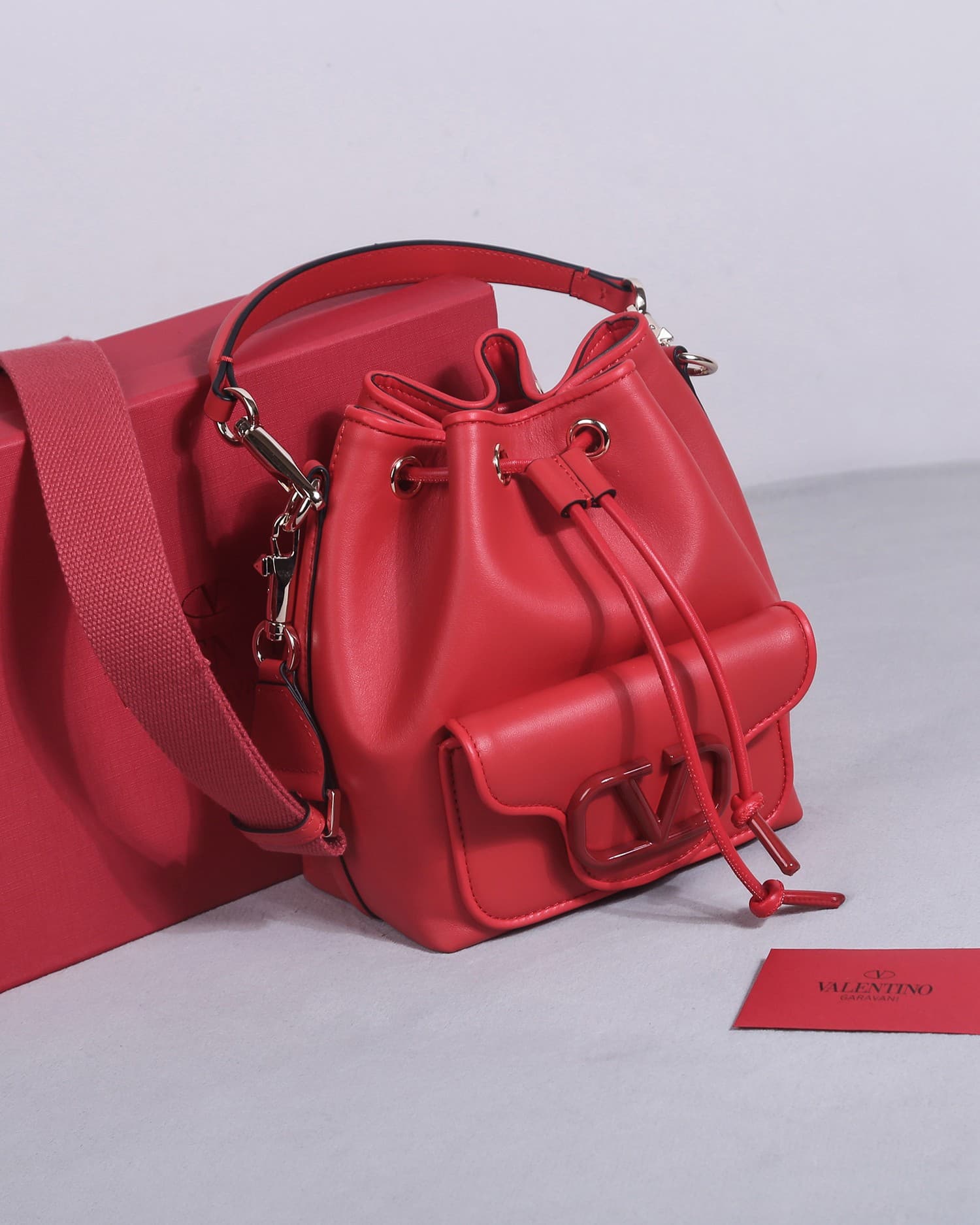 Valentino Garavani Locò calfskin leather bucket bag in red 22058 High