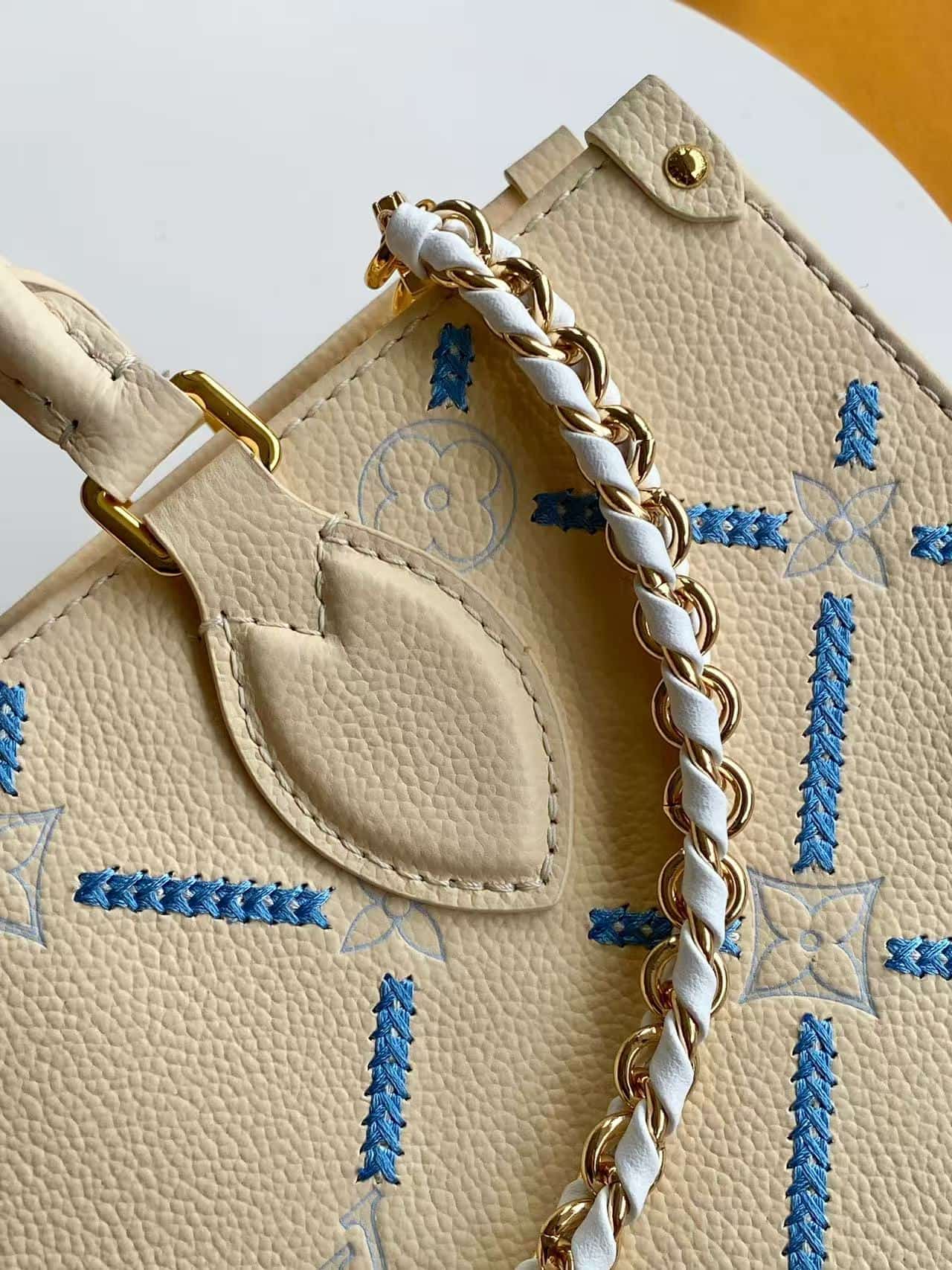 Louis Vuitton Onthego East West Light Bliss Couture Cowhide leather M29487 High