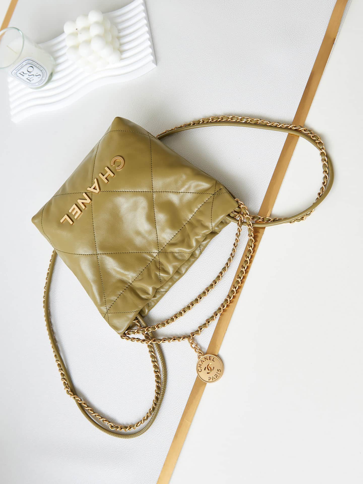 Chanel 22 MINI HANDBAG Shiny Calfskin Brown & Gold-Tone Metal AS3980 A