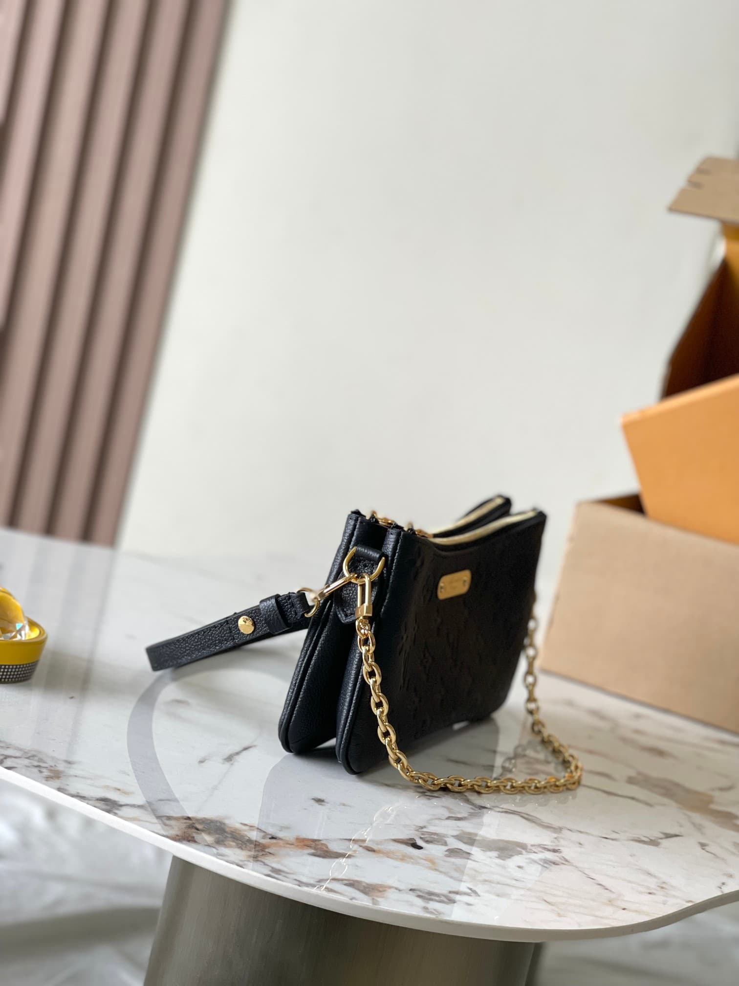 Louis Vuitton Pochette Liv Black Monogram Empreinte embossed supple grained cowhide leather M83301 TOP