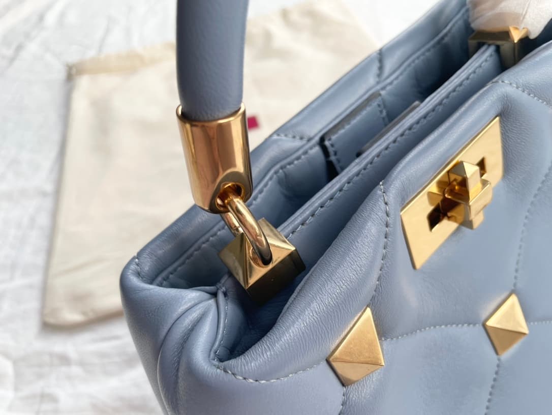 Valentino Garavani Roman Stud leather top handle bag blue high