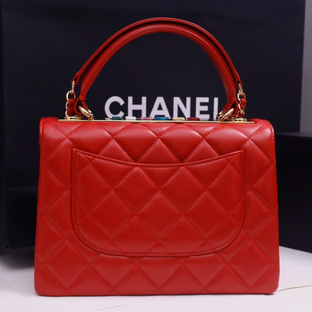 SMALL FLAP BAG WITH TOP HANDLE Lambskin Gold Metal Red A