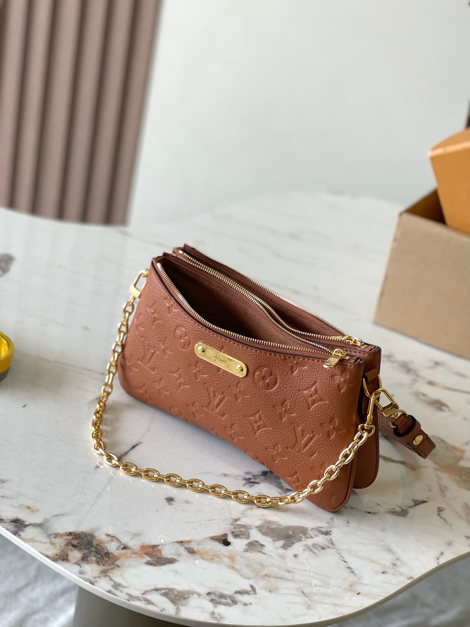 Louis Vuitton Pochette Liv Cognac Monogram Empreinte embossed supple grained cowhide leather M11916 TOP