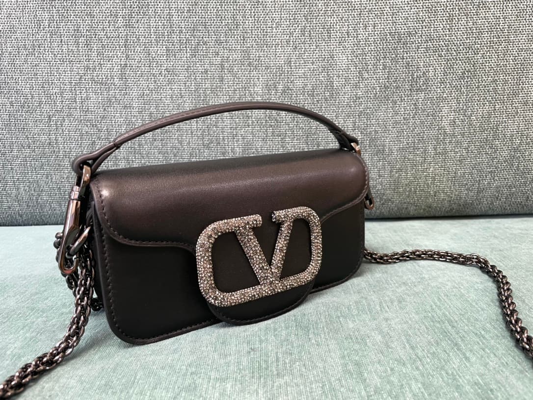 Valentino Garavani Locò Mini leather shoulder bag with crystal VLogo High