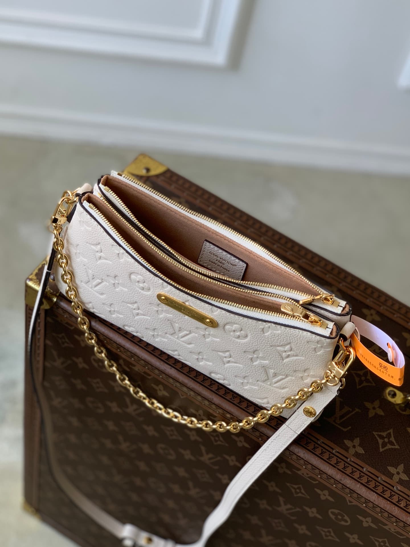 Louis Vuitton Pochette Liv Crème Monogram Empreinte Leather M3A838 High