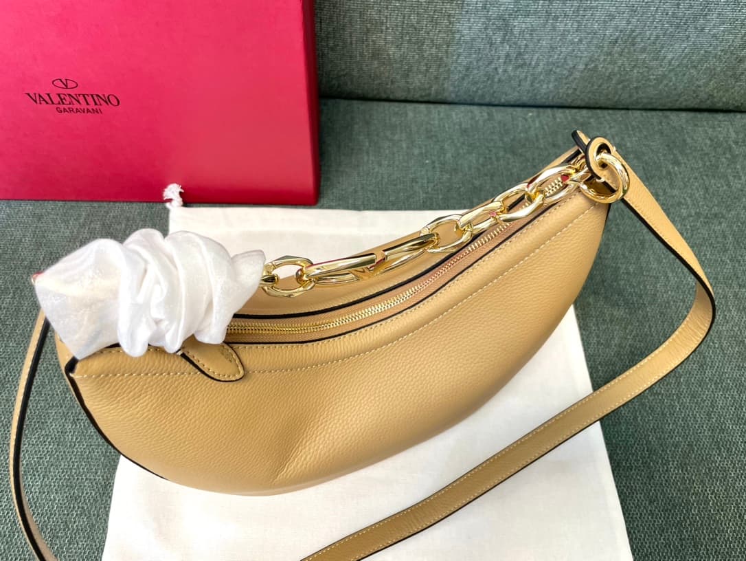 Valentino Garavani VLogo Moon small hobo bag in beige grained calfskin High