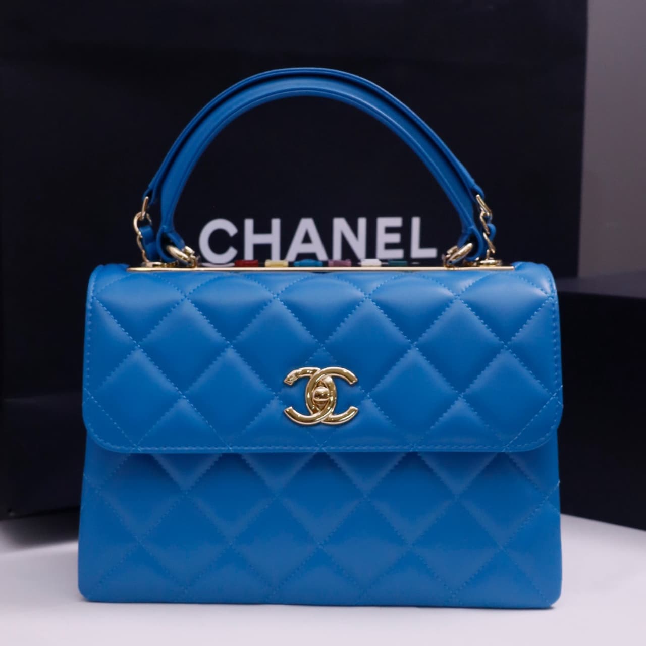 SMALL FLAP BAG WITH TOP HANDLE Lambskin Gold Metal Blue A