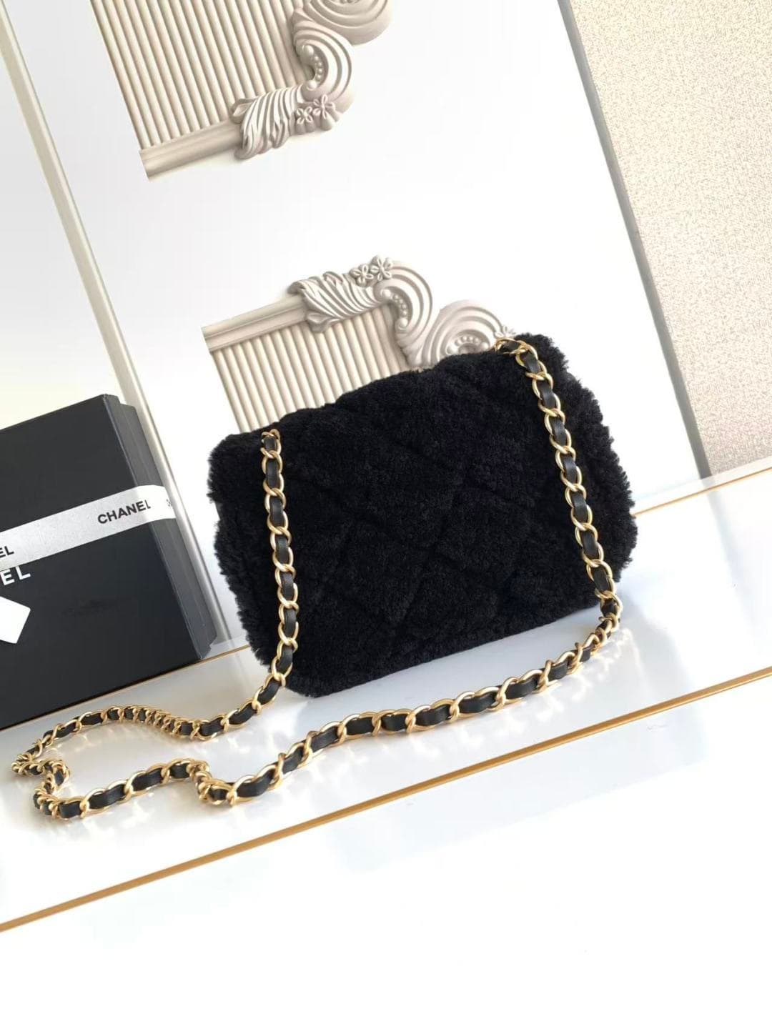 Chanel Mini Shearling Flap Bag in Black lambskin with black shearling & Gold-Tone Metal AS5148 A