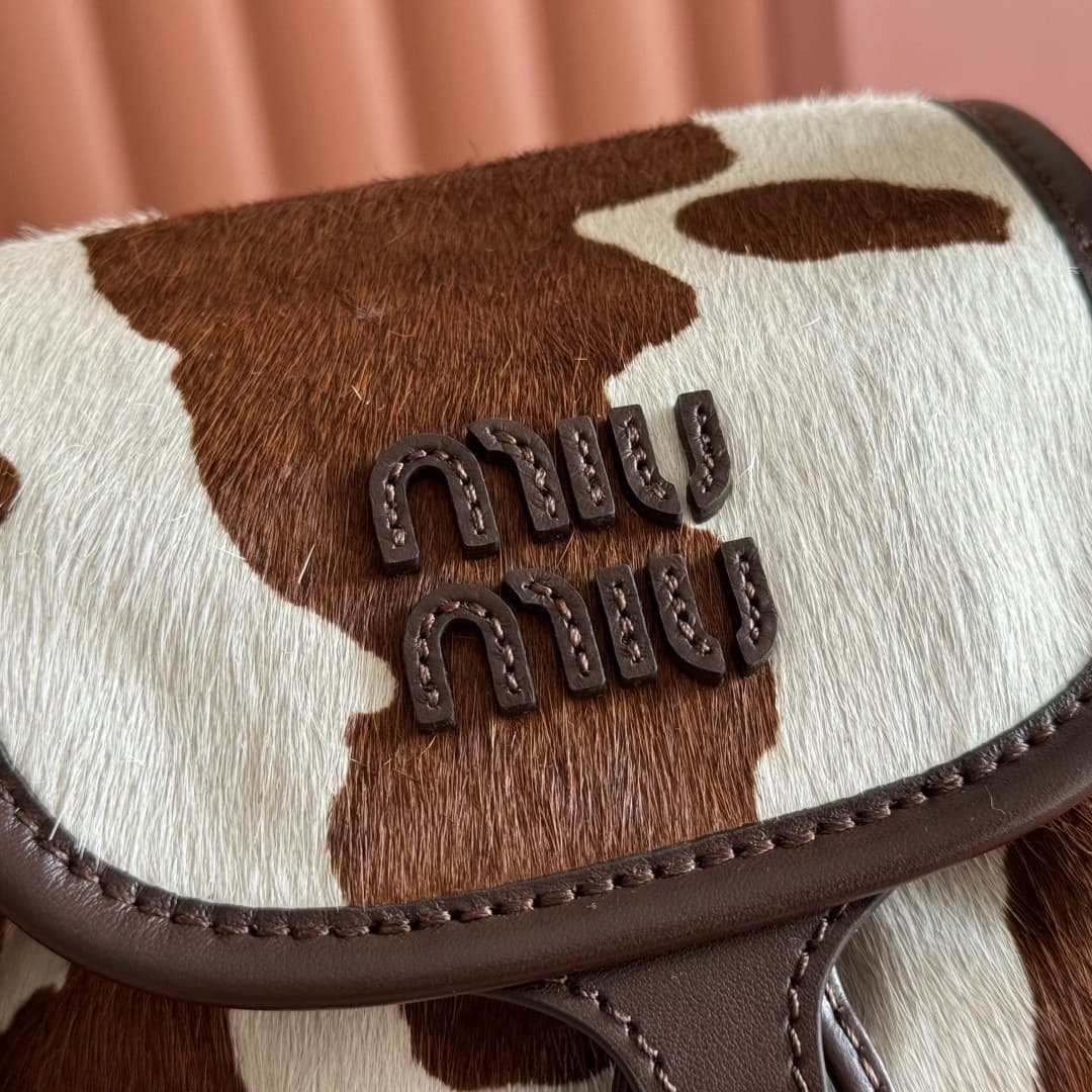 Miu Miu Calf Hair Backpack in brown and white cow print 5BZ043 TOP