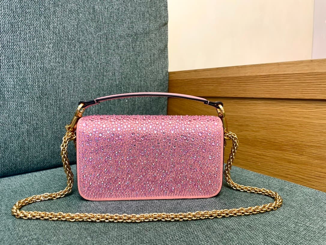 Valentino Garavani Locò Small Shoulder Bag in Pink High