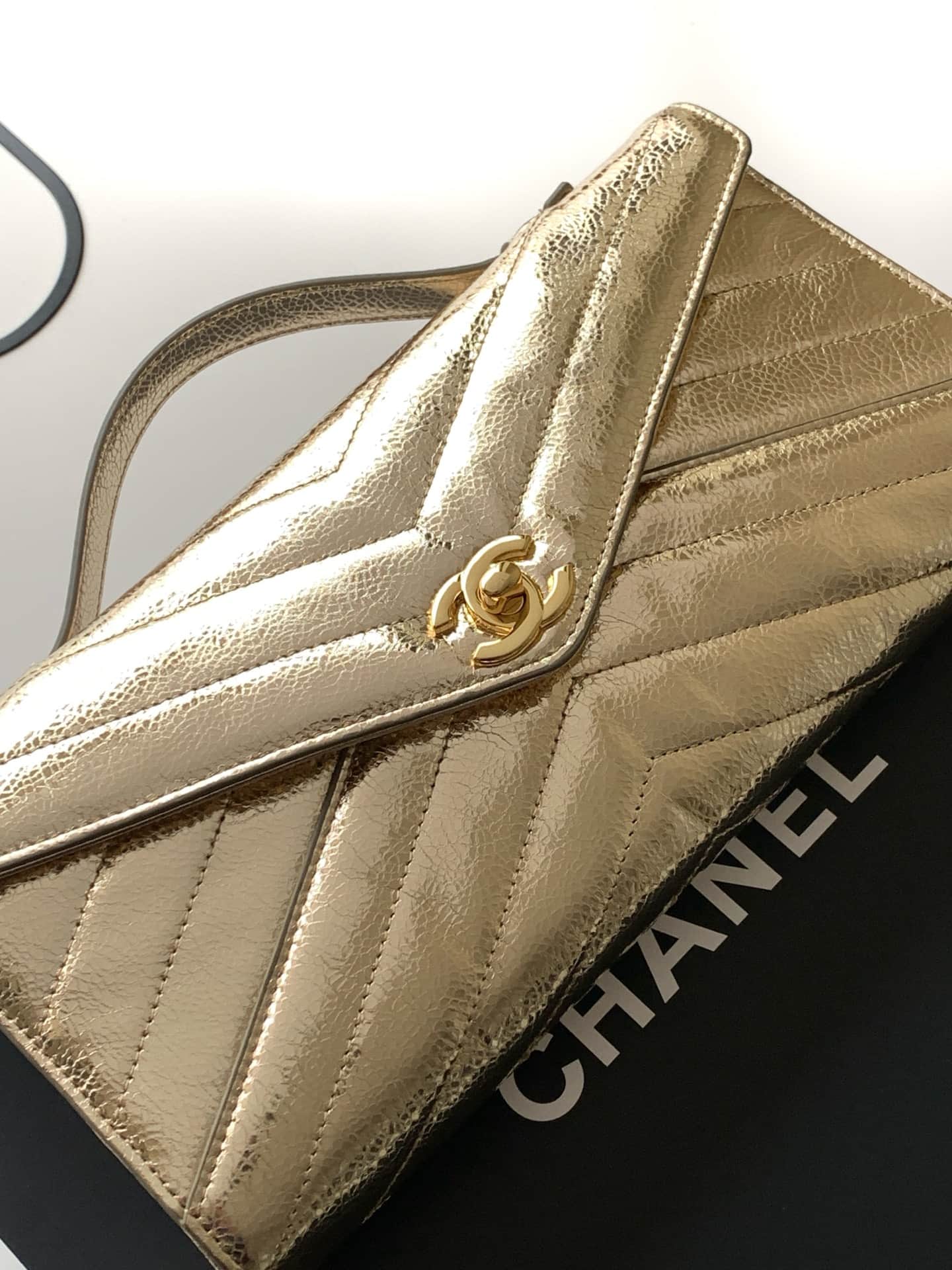 Chanel Flap Bag with Top Handle Metallic Chevron Calfskin Leather Finish& Gold-Tone Metal Champagne Gold AS6044 A