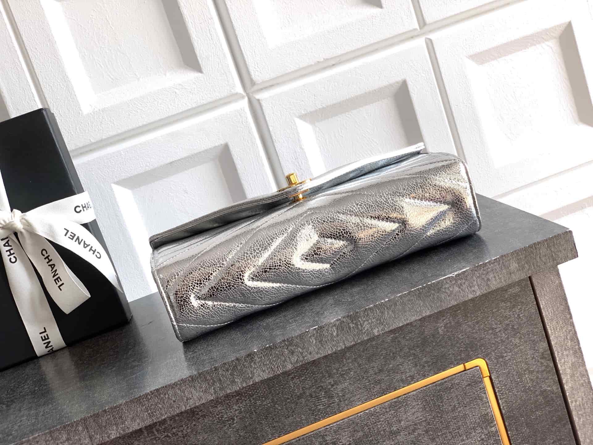 Chanel Flap Bag with Top Handle Metallic Chevron Lambskin Leather Finish& Gold-Tone Metal Silver AS6044 A