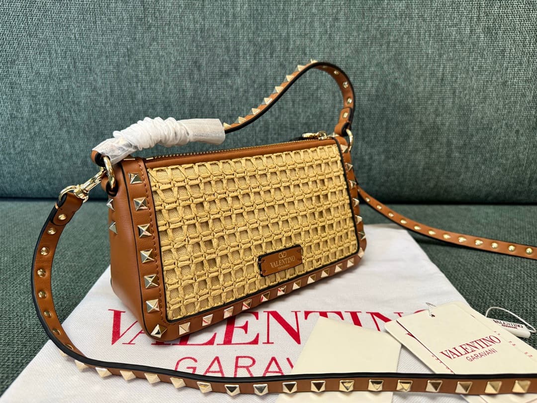 Valentino Garavani Rockstud Raffia and leather crossbody clutch High