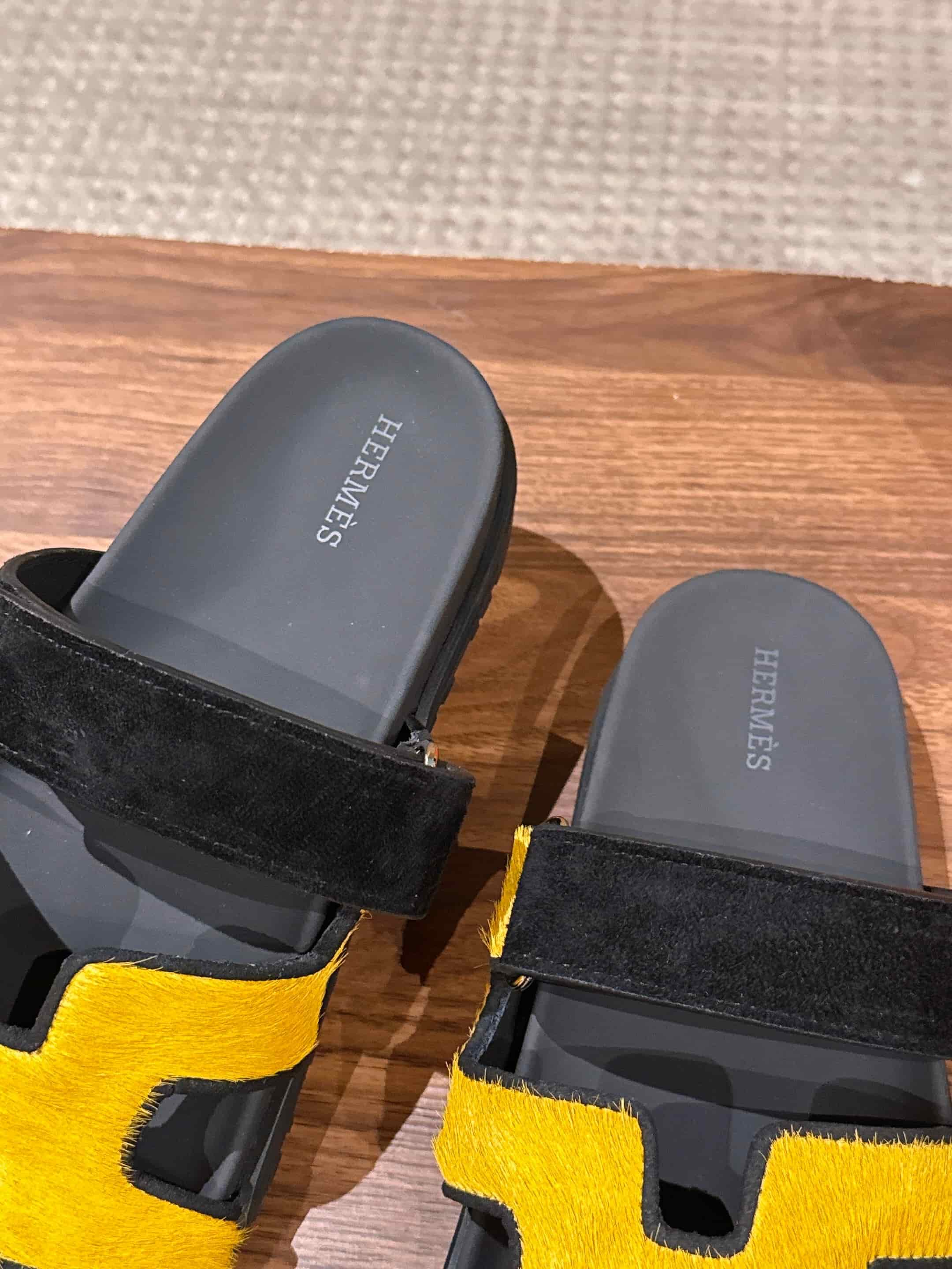 Hermès Chypre sandals in yellow suede with black accents Women Men