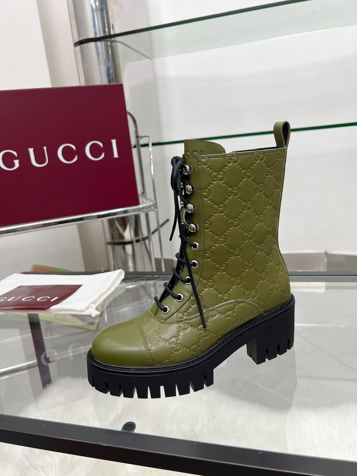 Gucci Women's lace-up ankle boots with GG