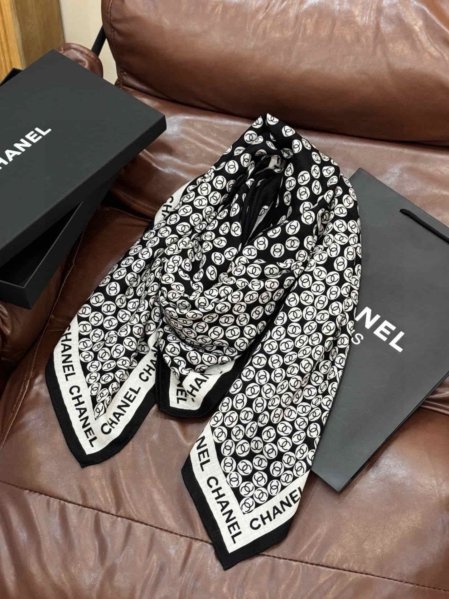 Chanel silk scarf featuring polka dot pattern