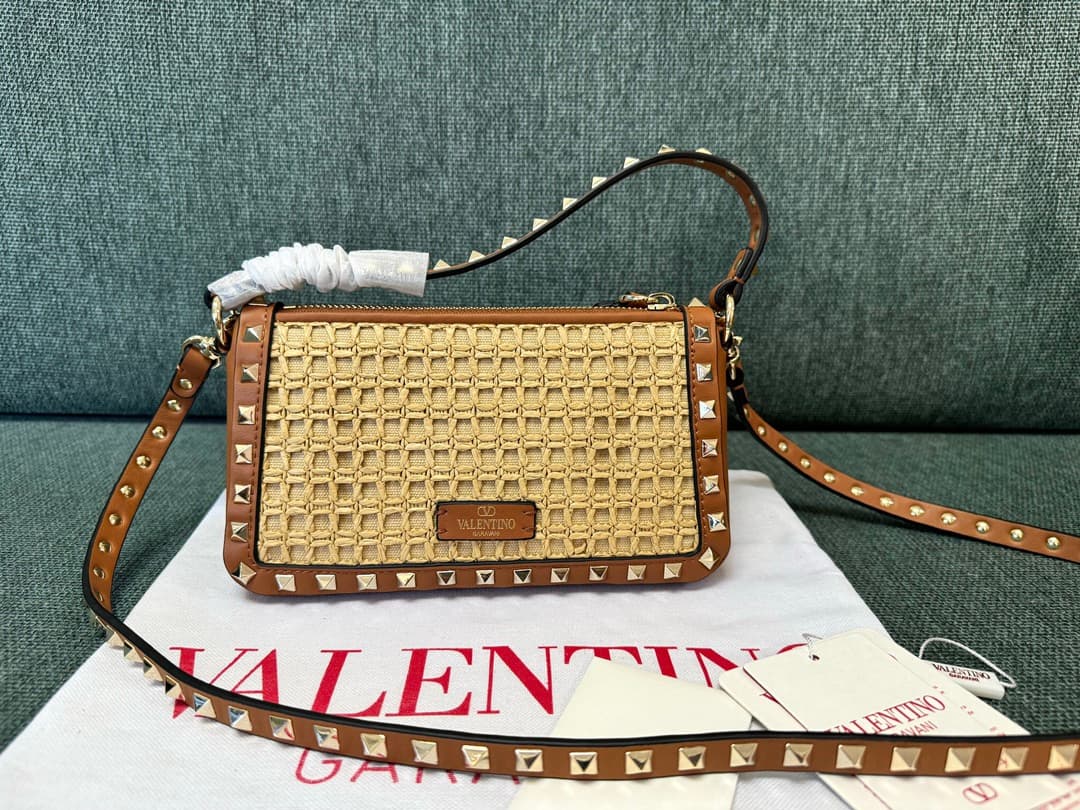 Valentino Garavani Rockstud Raffia and leather crossbody clutch High