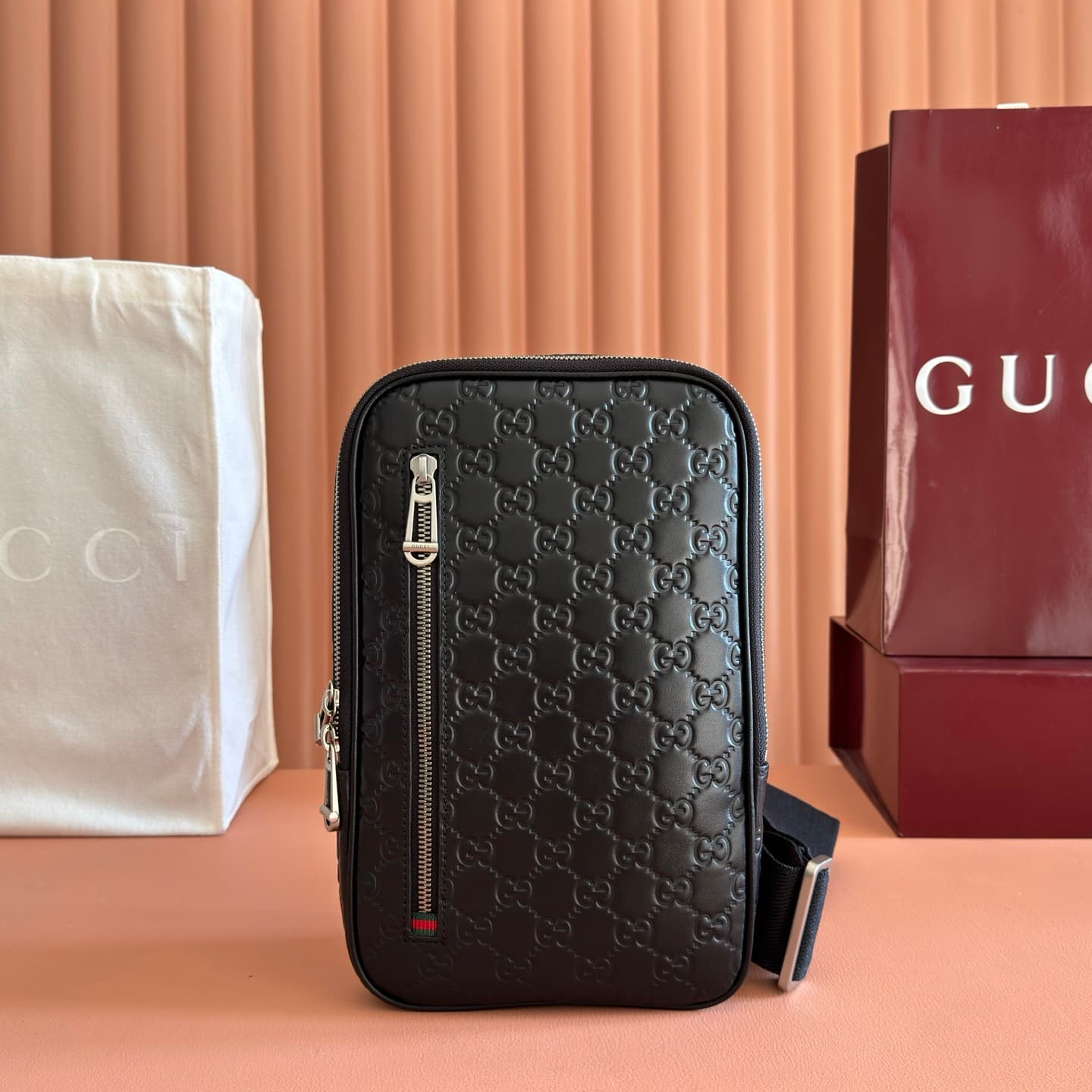 Gucci GG Emblem small crossbody bag Black embossed GG smooth leather 862915 High