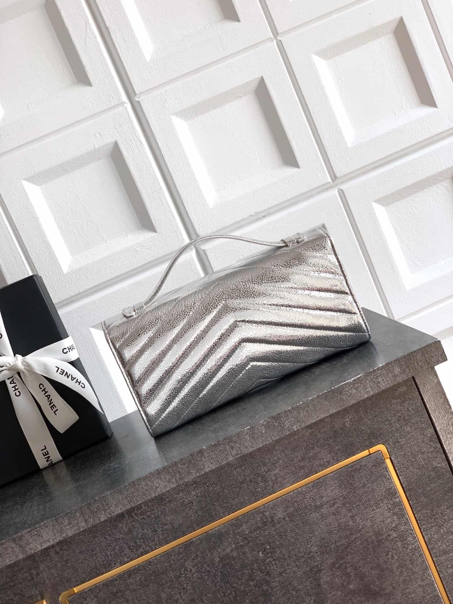 Chanel Flap Bag with Top Handle Metallic Chevron Lambskin Leather Finish& Gold-Tone Metal Silver AS6044 A