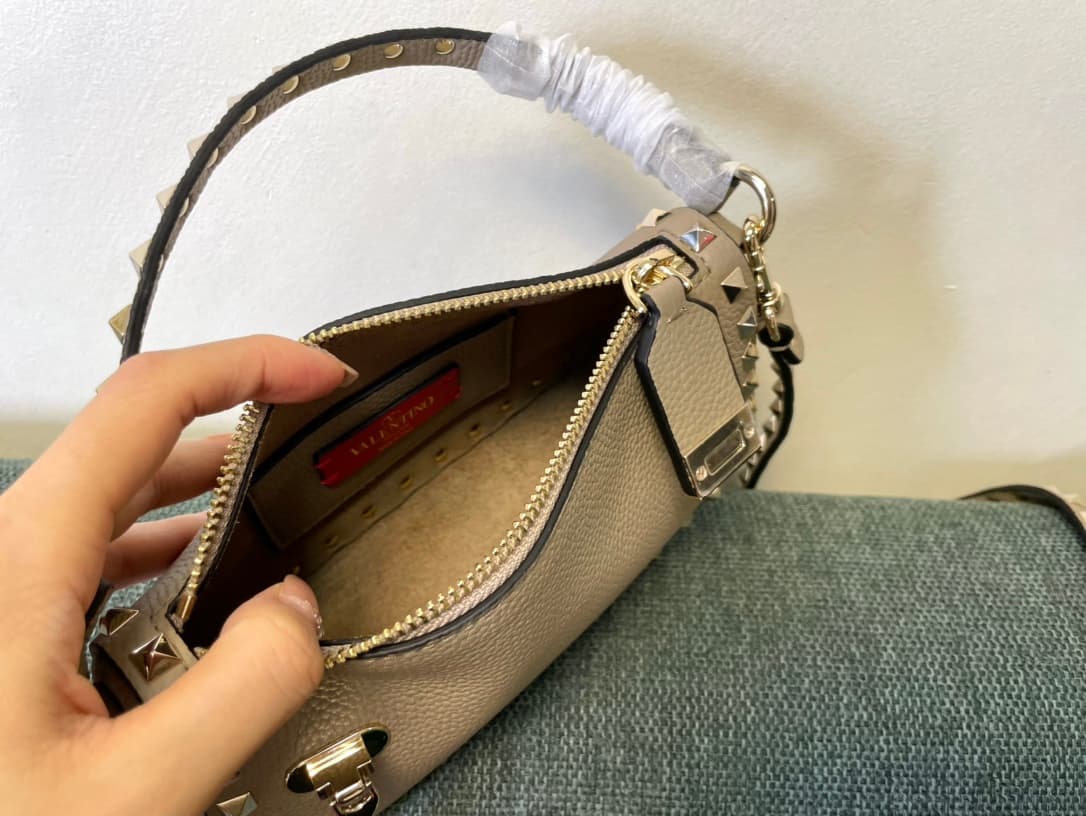 Valentino Garavani Mini Rockstud crossbody bag in Beige Grained Calfskin High