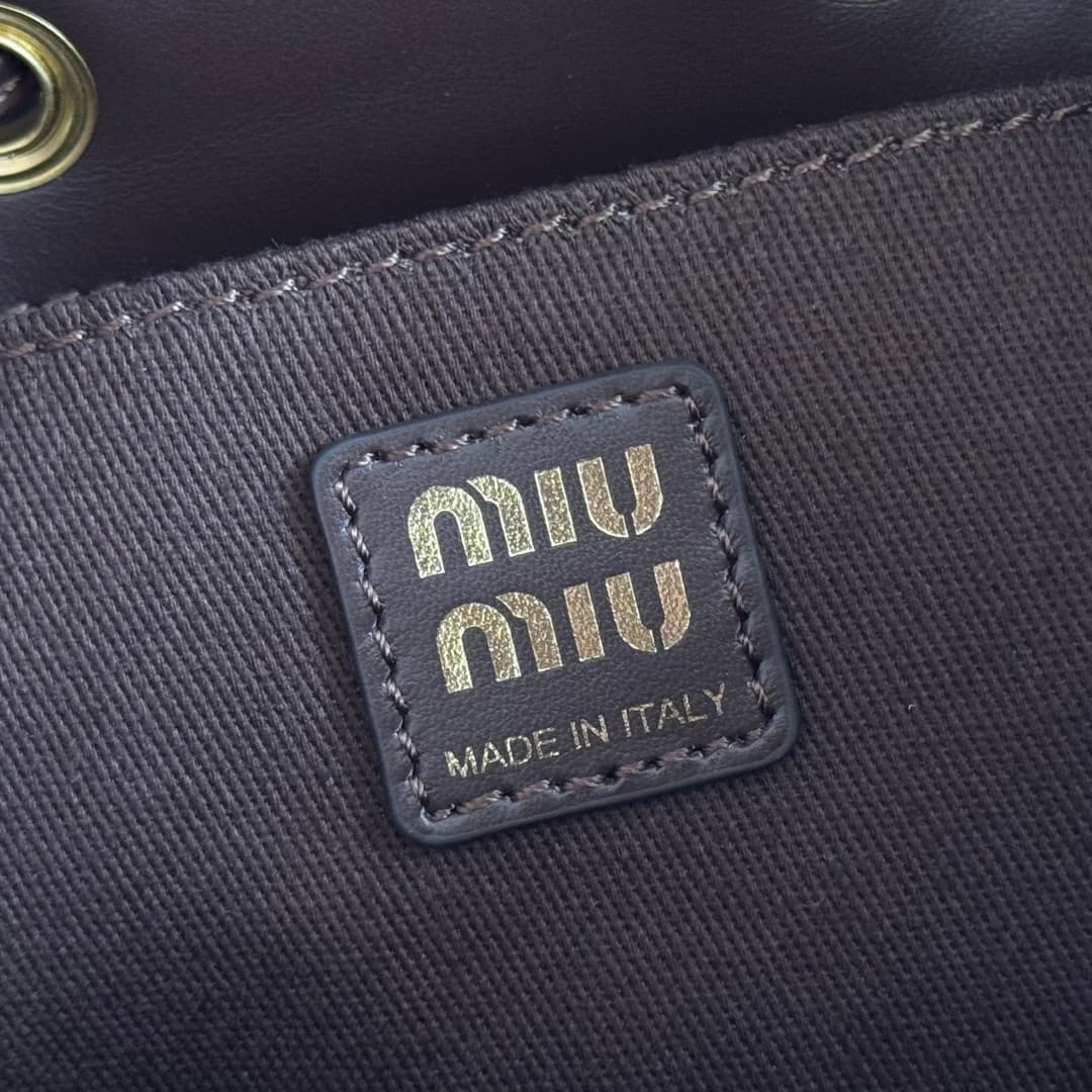 Miu Miu Calf Hair Backpack in brown and white cow print 5BZ043 TOP