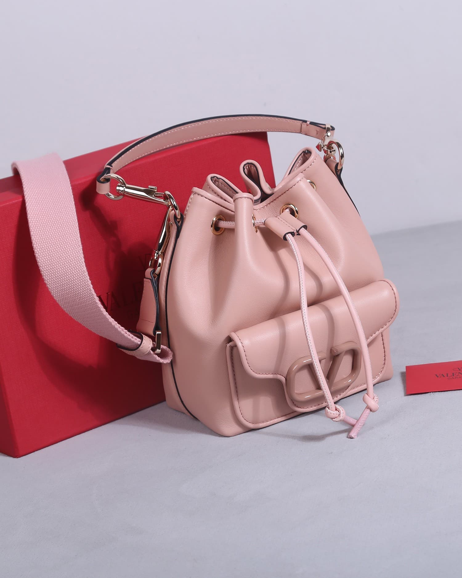Valentino Garavani Locò calfskin leather bucket bag in soft pink 22058 High
