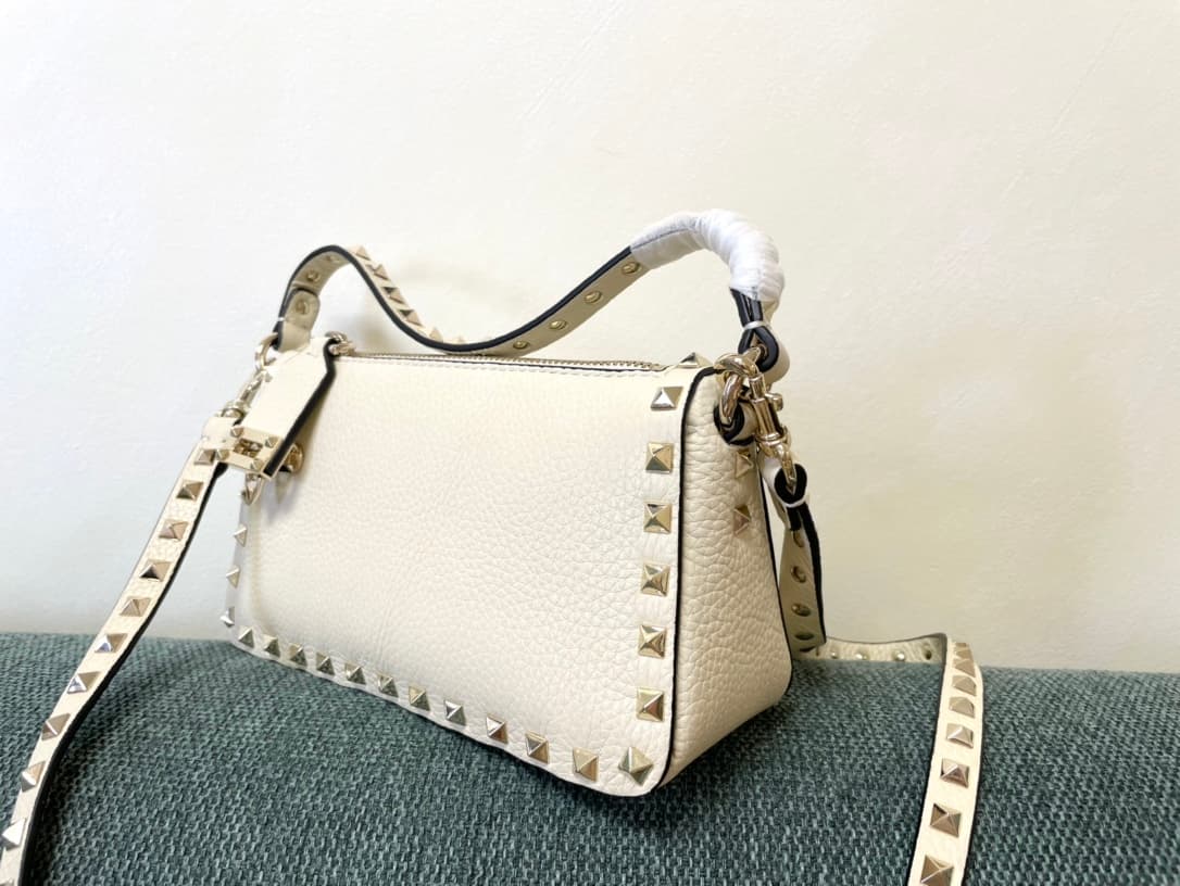 Valentino Garavani Mini Rockstud crossbody bag in White Grained Calfskin High