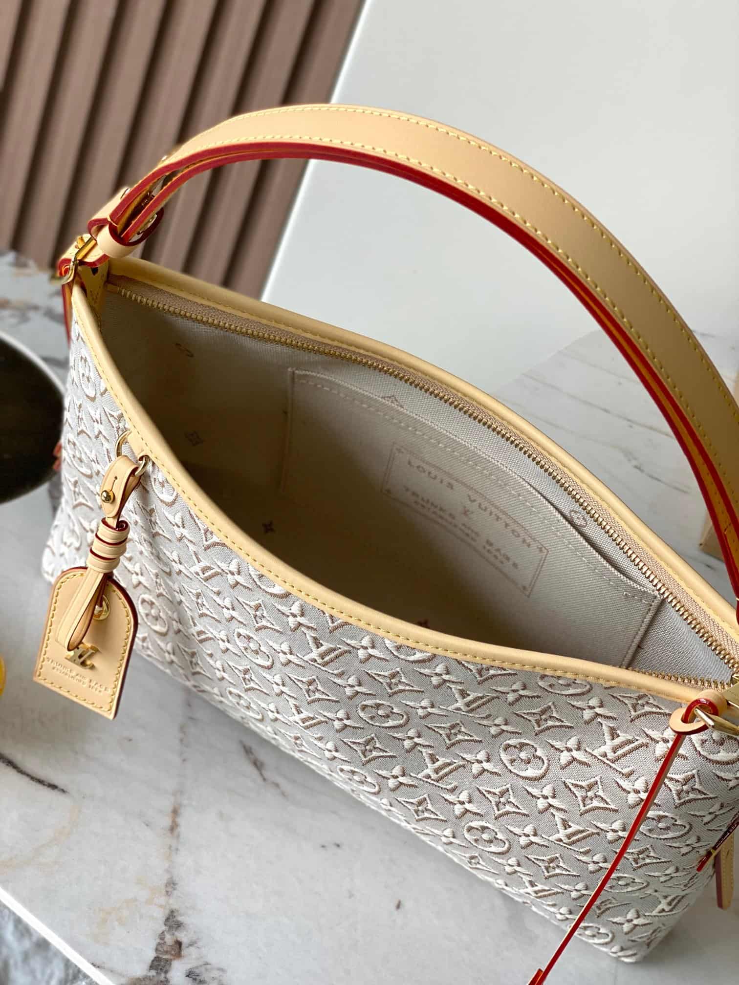 Louis Vuitton Carryall East-West Monogram Emblème Peuplier M2A136 TOP