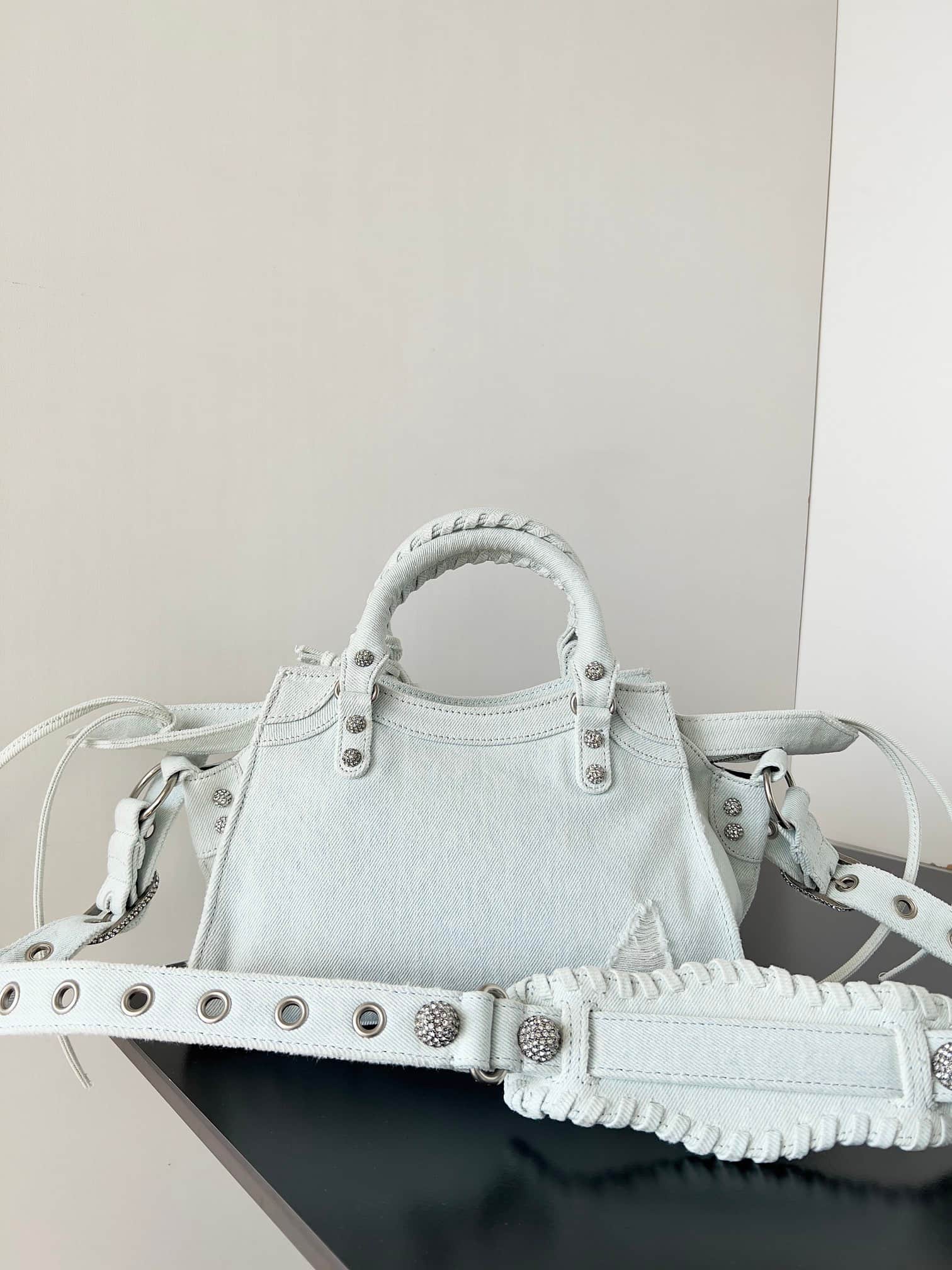 Balenciaga Small Neo Cagole City bag in Washed Frayed Denim with crystal High
