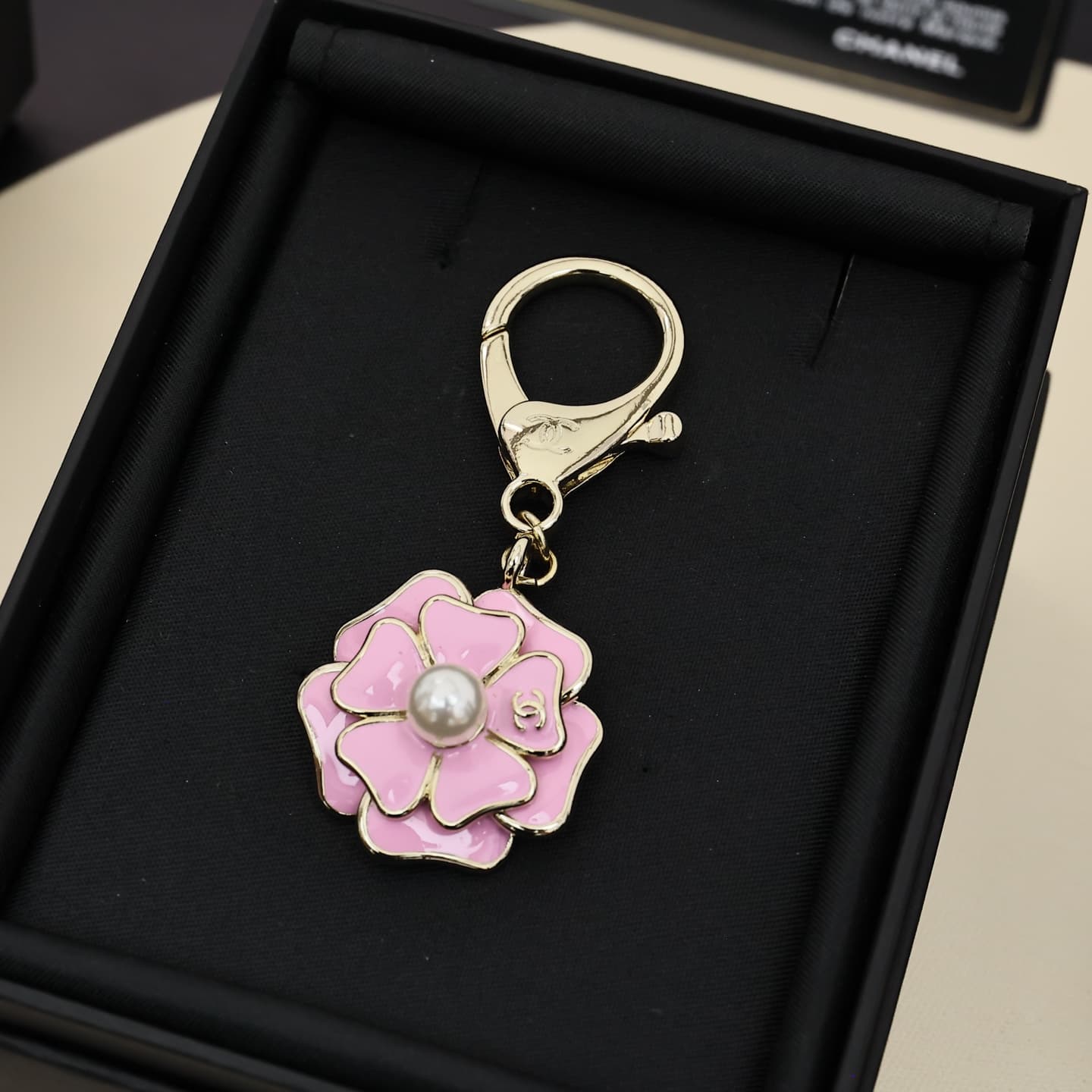 Chanel Enamel Camellia Pearl Keychain