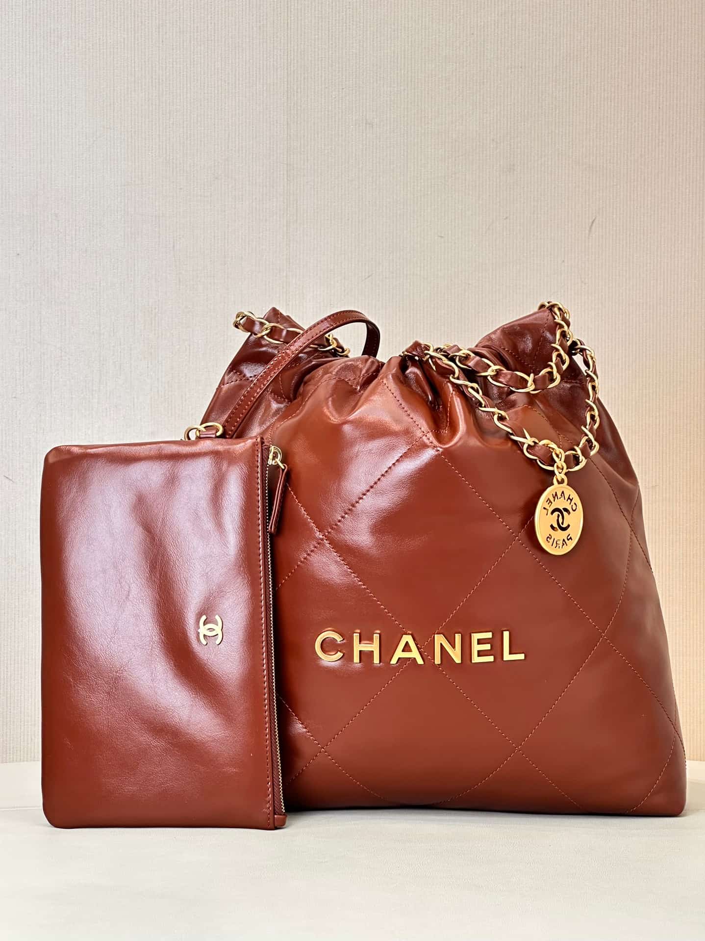 Chanel 22 Small handbag Shiny calfskin & Gold-tone metal AS3260 Brown TOP