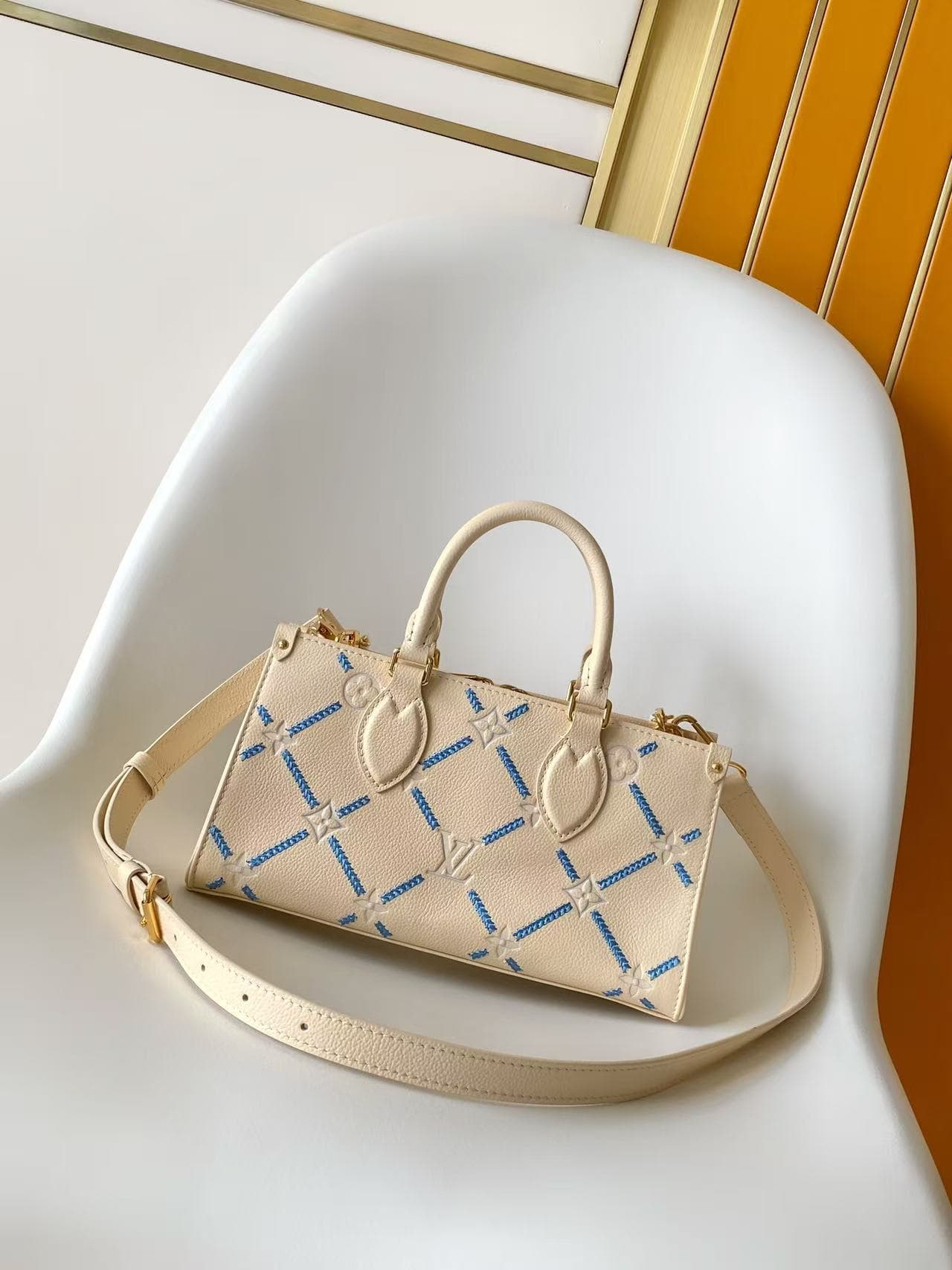 Louis Vuitton Onthego East West Light Bliss Couture Cowhide leather M29487 High