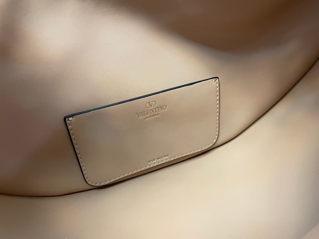 Valentino Garavani VLogo Moon small hobo bag in beige grained calfskin High