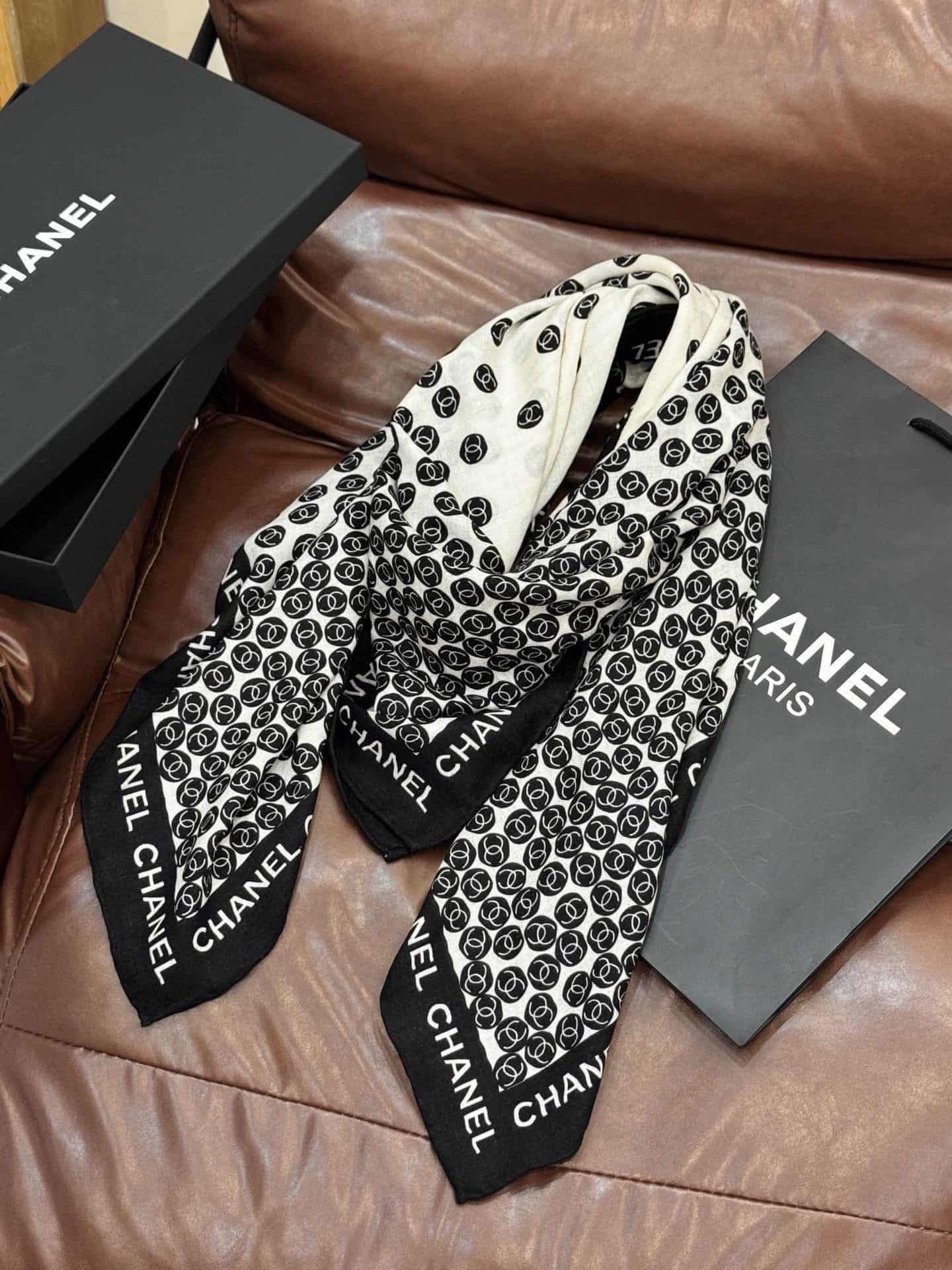 Chanel silk scarf featuring polka dot pattern