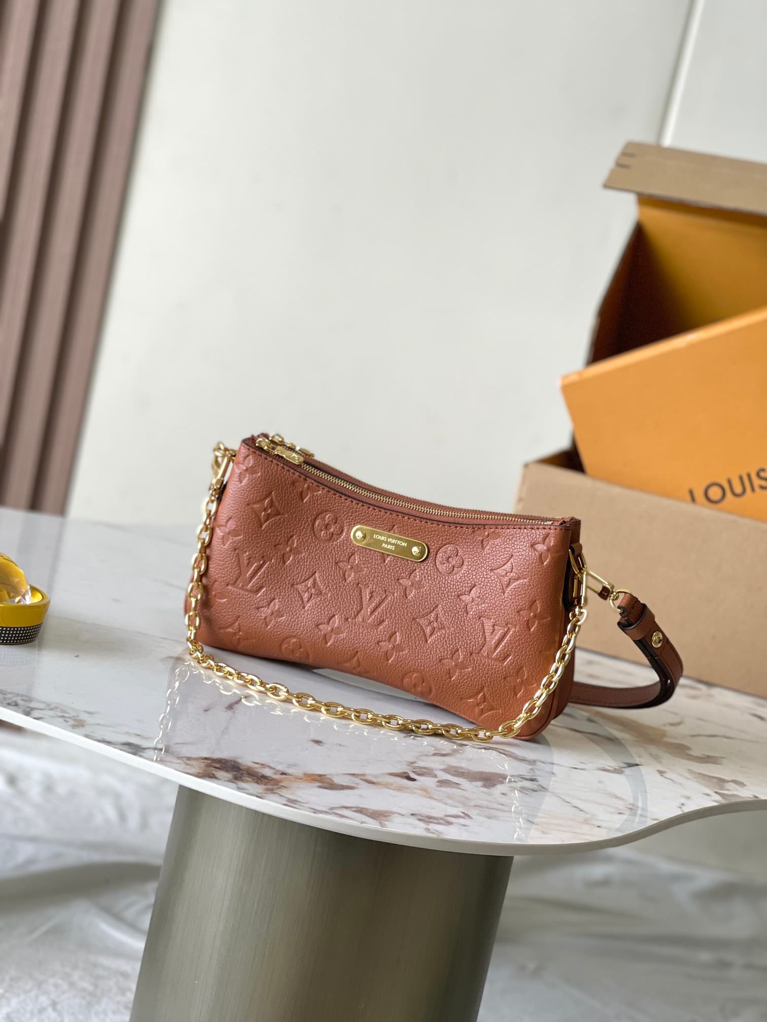 Louis Vuitton Pochette Liv Cognac Monogram Empreinte embossed supple grained cowhide leather M11916 TOP