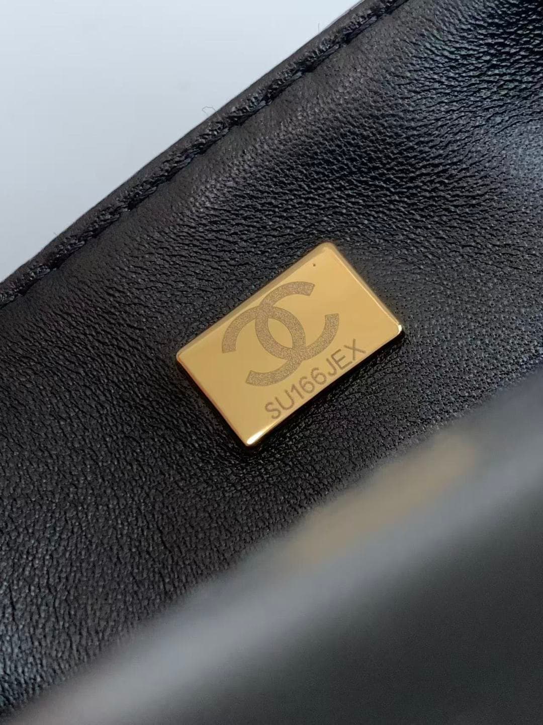 Chanel Mini Shearling Flap Bag in Black lambskin with black shearling & Gold-Tone Metal AS5148 A
