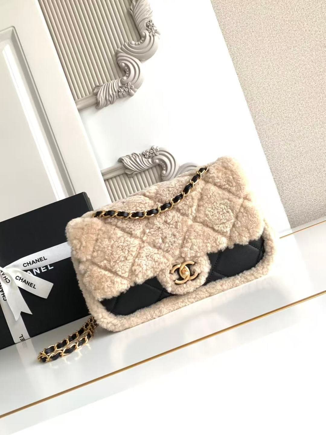 Chanel Small Shearling Flap Bag in Black lambskin with beige shearling & Gold-Tone Metal AS5149 A